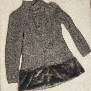 Gray wool coat with faux fur bottom trim.